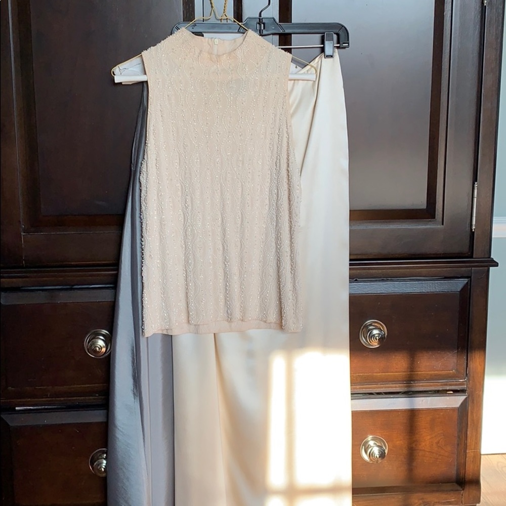 beaded top with two floor length satin skirts